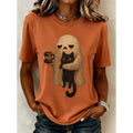 Rachel | Women's Ghost Cat Halloween Graphic Tee, Relaxed Crew Neck T-Shirt | Animated Apparel | Orange